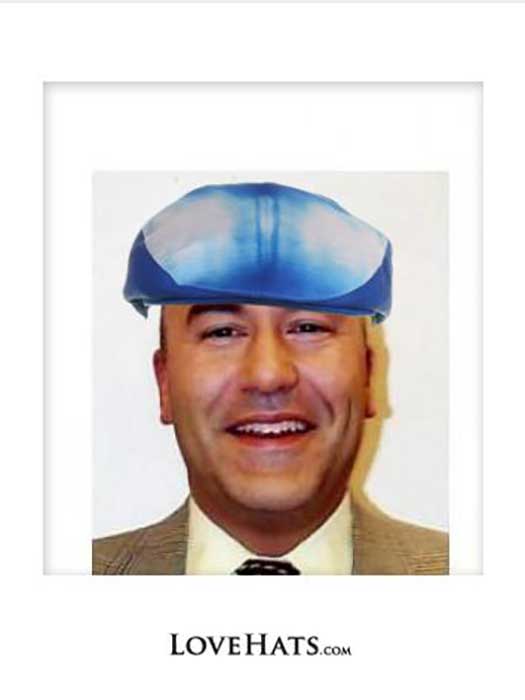 Frank Porter wearing a blue hat of some sort.