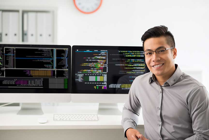 accessibility engineer sitting in front of his computer