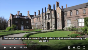 The YouTube video player showing a video about York St John University with closed captions switched on. The captions are displayed over two lines with the end of the sentence cut off.