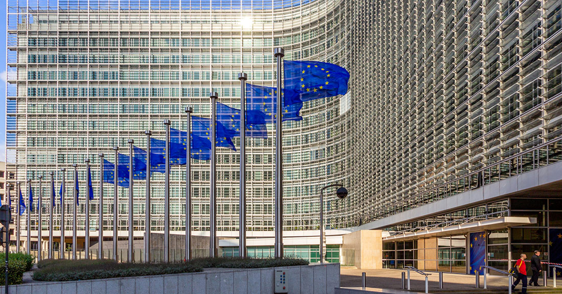 Row of EU Flags in front of the European Union Commission building in Brussels