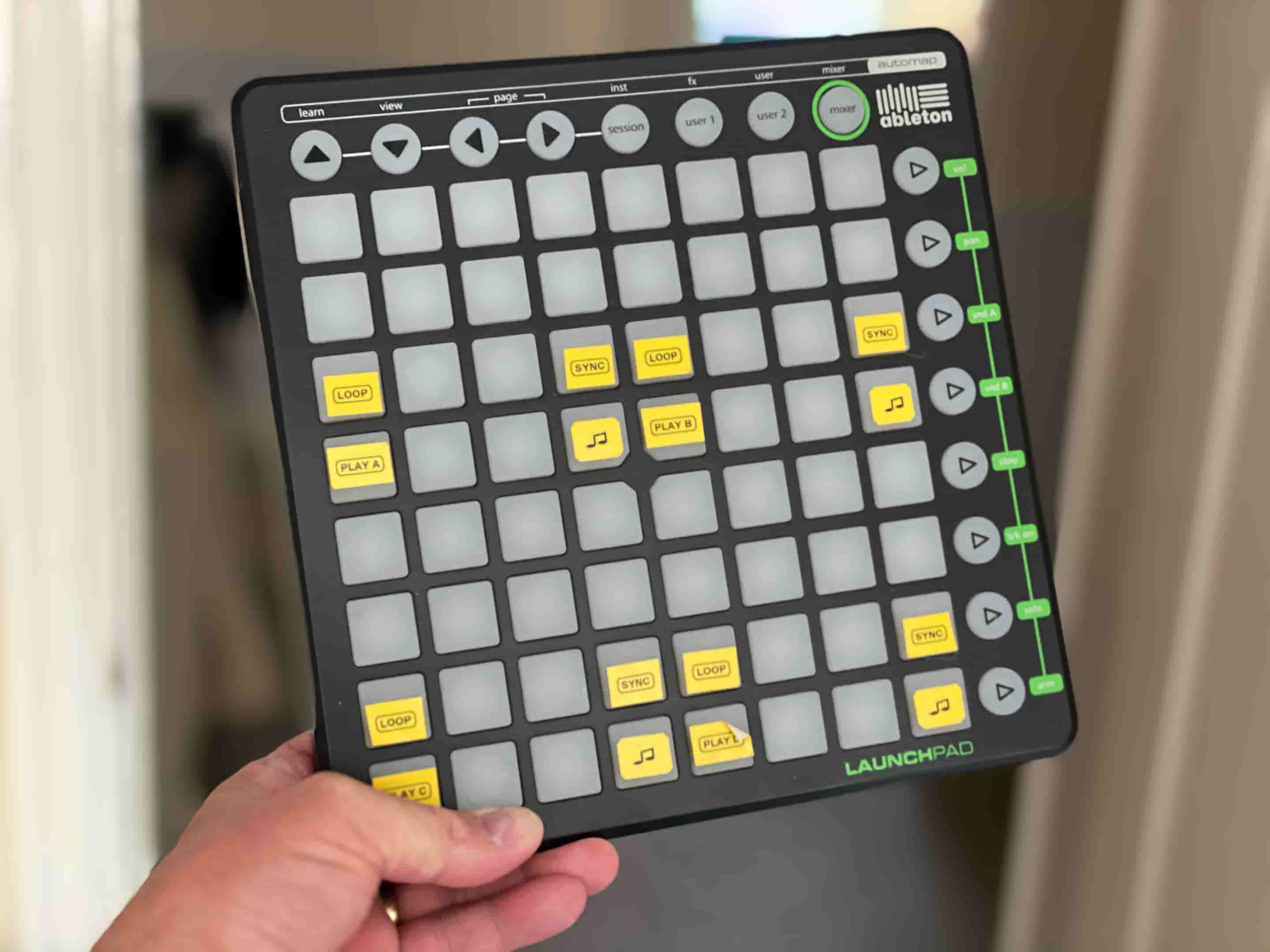 An Ableton LaunchPad MIDI controller - an 80-button controller that could be used to control all manner of events through Keyboard Maestro or similar apps