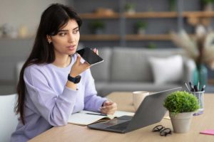 woman using voice search on a phone