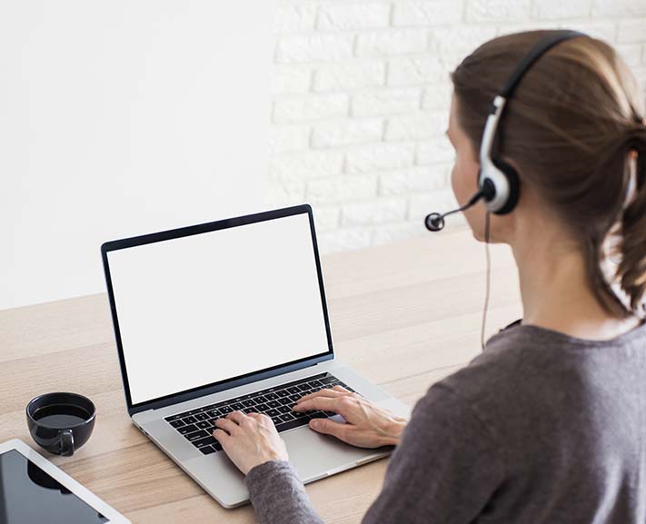 female student on computer learning remotely with the help of JAWS scripting