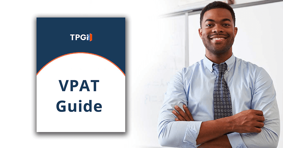 TPGi VPAT Guide. Man smiling with arms folding.
